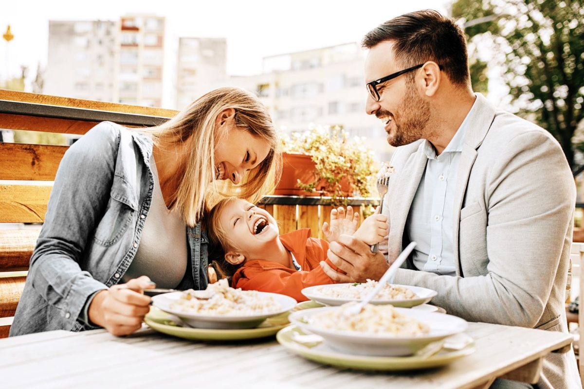 Family having dinner at a New Smyrna Beach restaurant