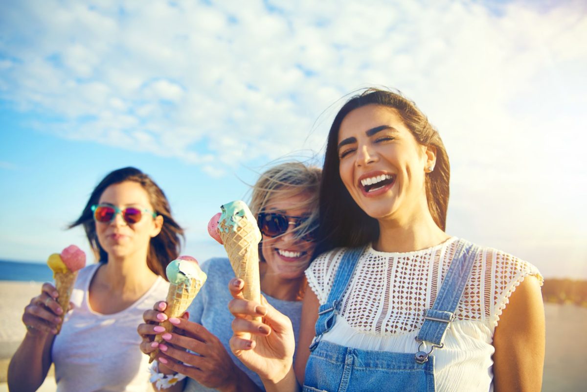women eating ice cream on New Smyrna Beach