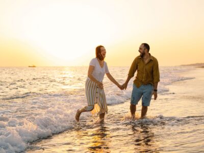 couple on the beach at sunset